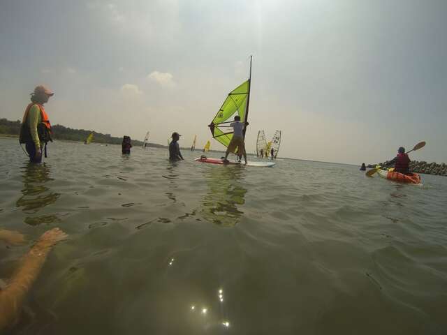 windsurfing lesson at the beach