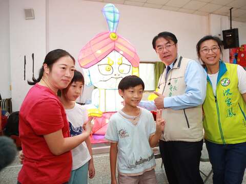 "A group photo of local trainees from Baihe (Dragon and Phoenix)"