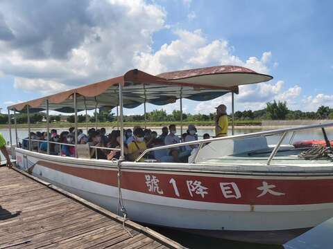 "Solar Boat Touring the Lake to Welcome Autumn"