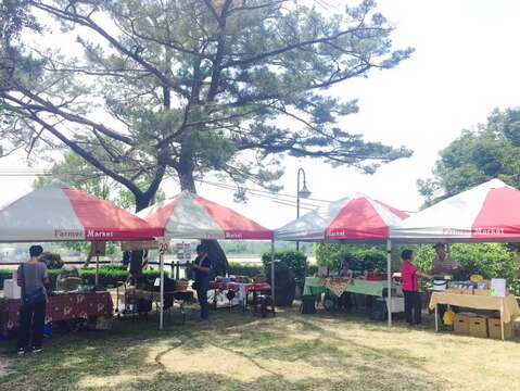 "Small farmers market by the lake during the holidays"