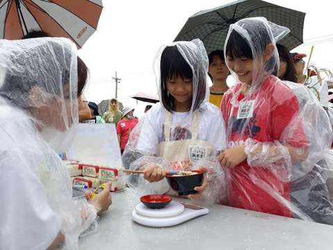 "Interactive game (chopsticks and rice fun)"